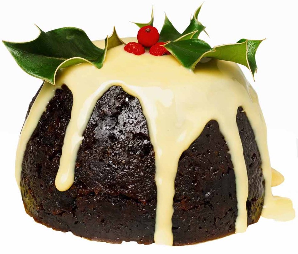 christmas pudding with custard --- Image by © Royalty-Free/Corbis